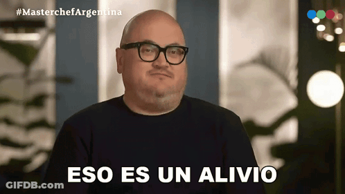 Bald Man With Glasses And Black Shirt Says Eso Es Un Alivio GIF