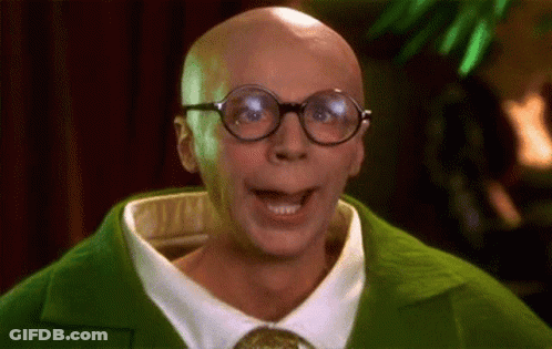 Bald Man With Glasses And Green Sweater Making Funny Face GIF