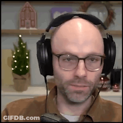Bald Man With Glasses And Headphones GIF