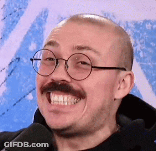 Bald Man With Glasses And Mustache Smiling GIF