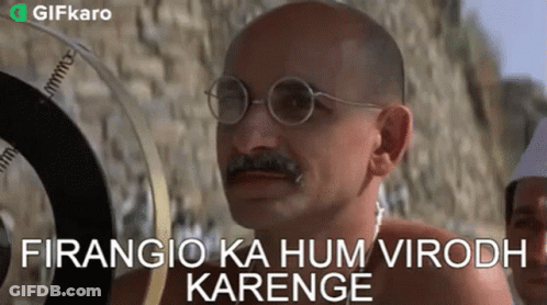 Bald Man With Glasses And Mustache Talking In Foreign Language GIF