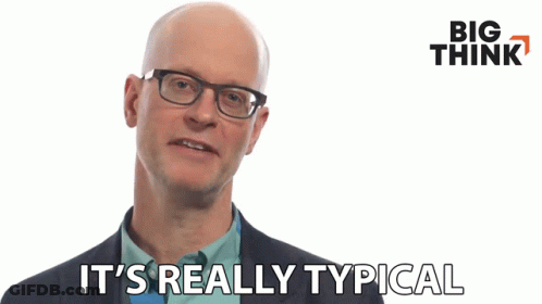 Bald Man With Glasses And Suit Says It's Really Typical GIF