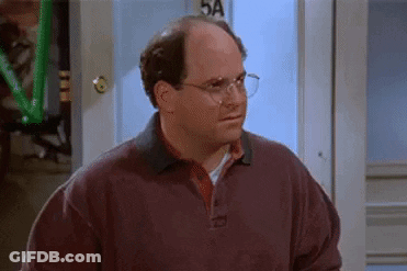 Bald Man With Glasses And Sweater At Door GIF