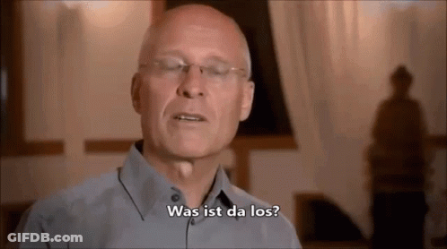 Bald Man With Glasses Says Was Ist Da Los GIF