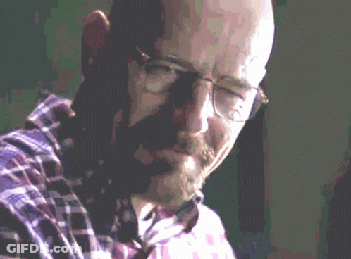Bald Man With Glasses Talking On Phone GIF