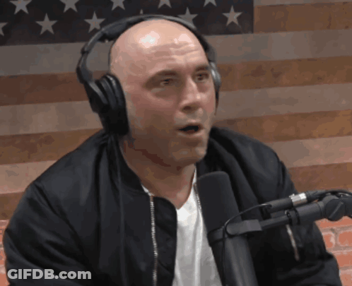 Bald Man With Headphones, Black Jacket And Microphone GIF