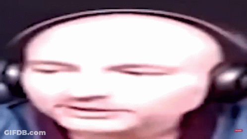 Bald Man With Headphones Making Face GIF
