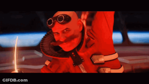 Bald Man With Mustache And Goggles In Red Suit GIF
