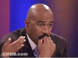 Bald Man With Mustache Covering Mouth GIF
