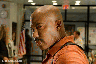 Bald Man With Mustache In Orange Shirt GIF
