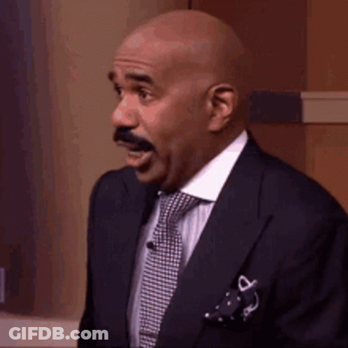 Bald Man With Mustache In Suit And Tie GIF