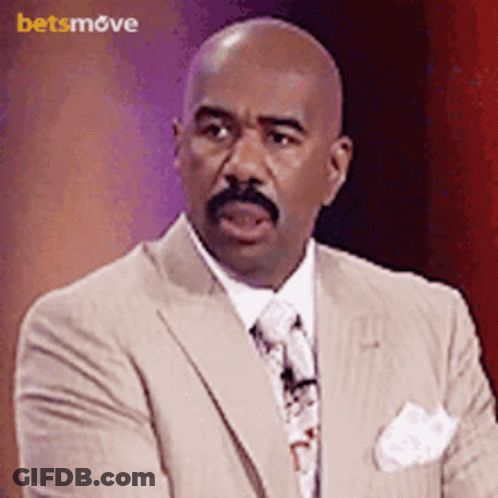 Bald Man With Mustache In Tan Suit GIF
