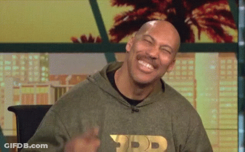 Bald Man With Mustache Laughing In Hoodie GIF