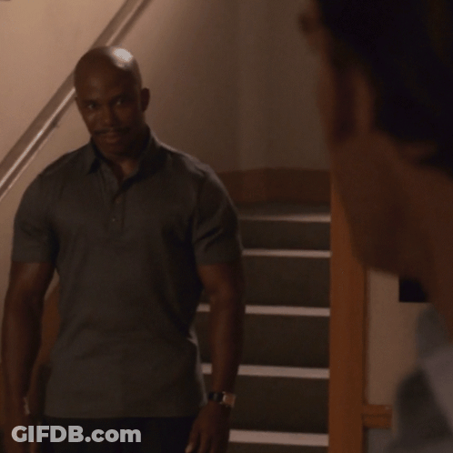 Bald Man With Mustache Next To Railing GIF