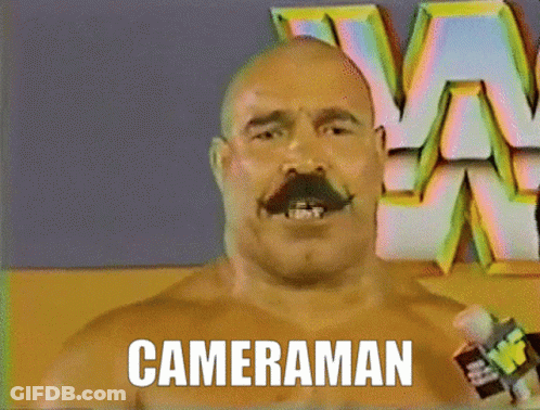 Bald Man With Mustache Saying Cameraman GIF