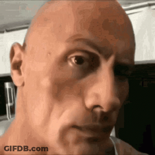 Bald Man With Serious Expression GIF