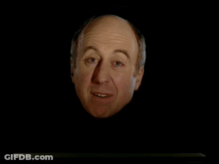 Bald Man With Sickbags On Standby Behind Him GIF