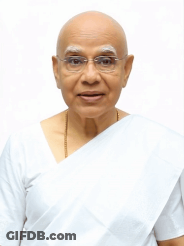 Bald Woman In Glasses And White Saree GIF