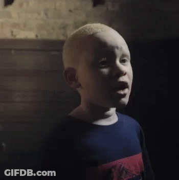 Bald Young Boy Making Funny Face GIF