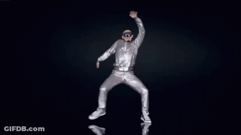 Ballerina Dancing In White Tutu And Pointe Shoes GIF