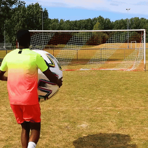 Balogun Kicking Huge Soccer Ball On Goal GIF