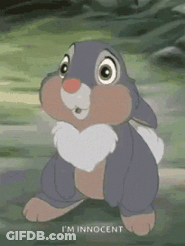 Bambi Rabbit Standing In Grass Looking At Camera GIF