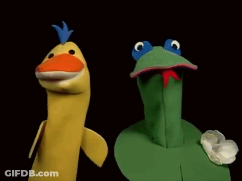 Banana Puppet And Frog Puppet Standing Together GIF