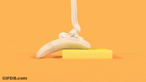 Banana Sitting On Yellow Square GIF