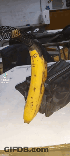 Banana With Painted Face Sitting GIF