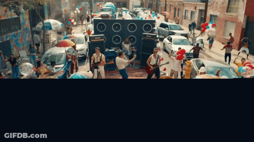 Band Performing On Stage GIF