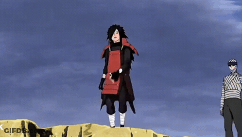 Bandaged Man Next To Man In Red Vest GIF