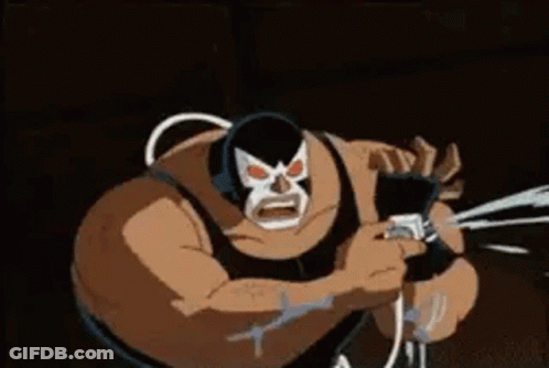 Bane From The Batman Animated Series Is Holding A Gun In His Hand . GIF