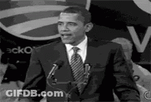 Barack Obama Giving Speech At Microphone GIF