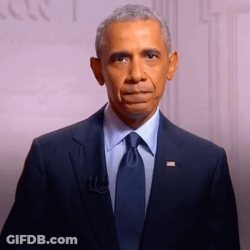 Barack Obama In Suit With American Flag Badge GIF