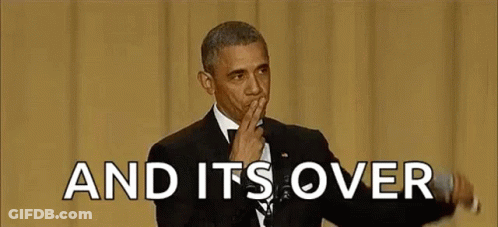 Barack Obama Is Holding A Microphone In His Hand And Covering His Mouth With His Hand . GIF