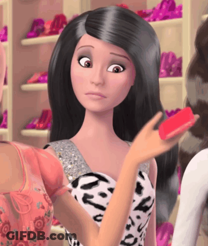 Barbie Doll Holding Red Object GIF