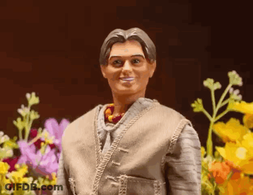 Barbie Doll Standing With Flowers GIF