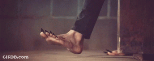 Bare Feet Standing On Concrete Floor GIF