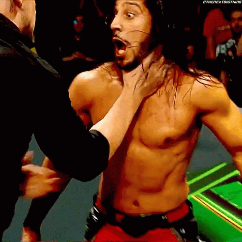Baron Corbin Chokeslam Mustafa Ali On Announcers Table GIF