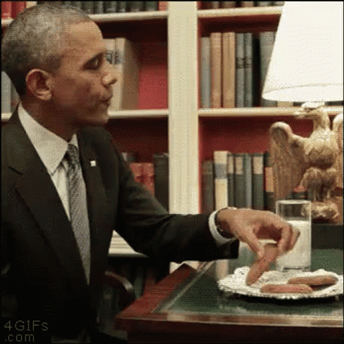 Barrack Obama Eats Famous Amos Cookie With Milk GIF