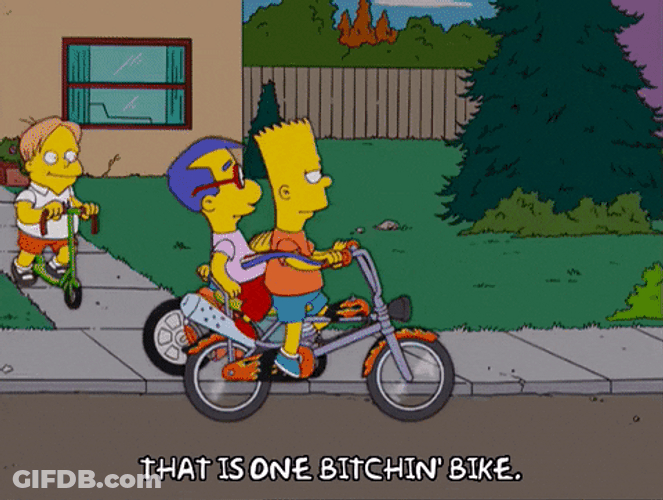 Bart Simpson Riding Bike On The Streets GIF