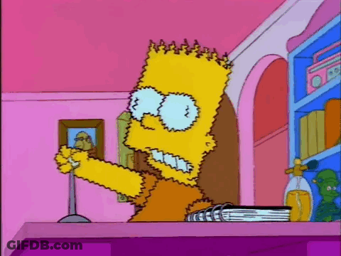 Bart Simpson Sitting On Purple Table Holding Book GIF