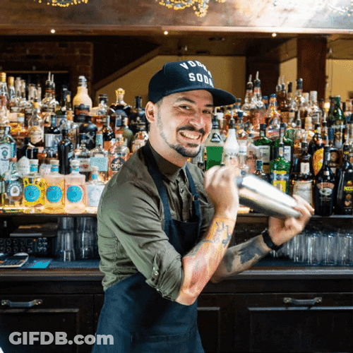Bartender In Cap Mixing Drinks GIF
