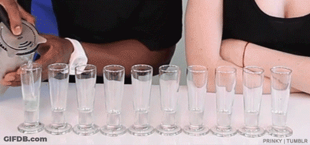 Bartender Pouring Colorful Drinks GIF