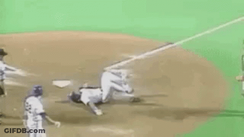 Baseball Catcher Kneeling As Player Runs GIF