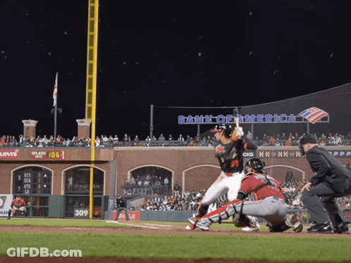 Baseball Game In Front Of Bank Of America Sign GIF