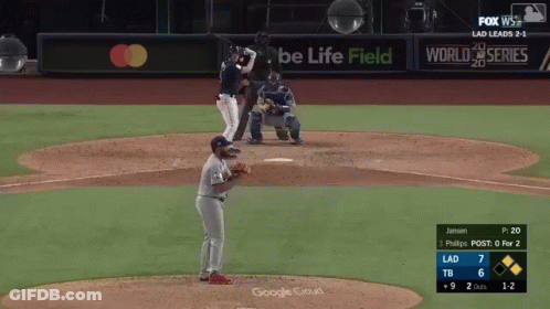 Baseball Game In Front Of Be Life Field Sign GIF