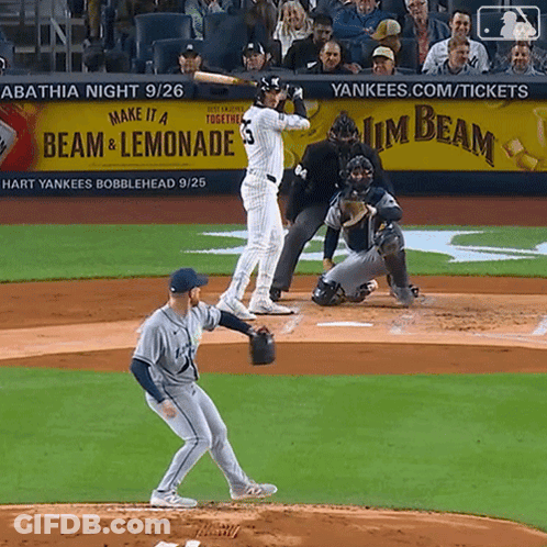 Baseball Game In Front Of Beam And Lemonade Ad GIF