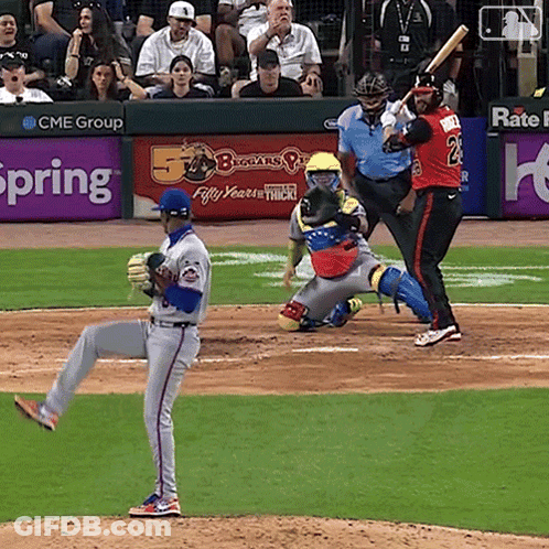 Baseball Game In Front Of CME Group Ad GIF