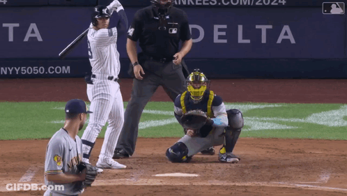 Baseball Game In Front Of Delta Logo GIF
